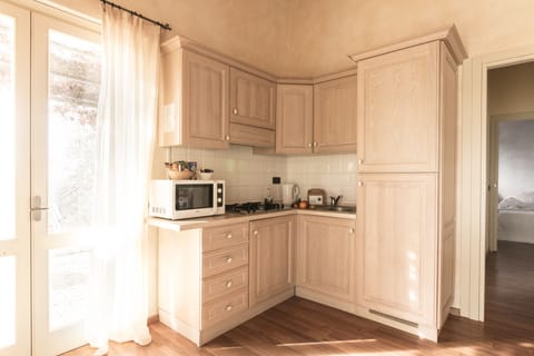 Standard Apartment, 2 Bedrooms | Private kitchenette | Full-size fridge, microwave, stovetop, coffee/tea maker