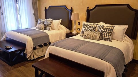 Premium Suite, 2 Queen Beds | Premium bedding, down comforters, in-room safe, individually decorated