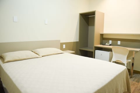 Deluxe Room, 1 Queen Bed, Non Smoking, Private Bathroom | Minibar, desk, laptop workspace, blackout drapes