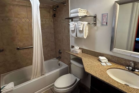 Room, 2 Queen Beds, Non Smoking | Bathroom | Combined shower/tub, rainfall showerhead, eco-friendly toiletries