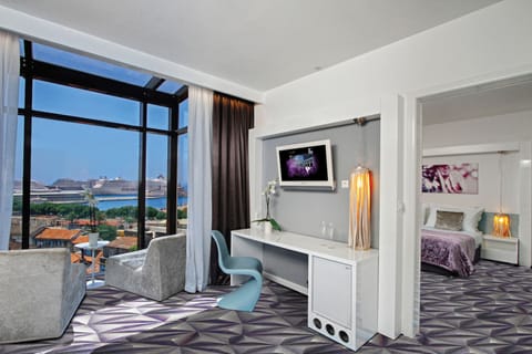 Deluxe Suite, Balcony, Sea View | Premium bedding, in-room safe, desk, blackout drapes