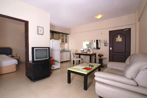 Regular Apartment (Suites-1BHK) | Living area | TV