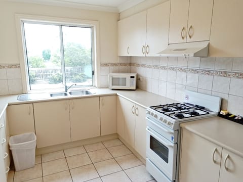 Three Bedroom Apartment (1) | Private kitchen | Fridge, microwave, coffee/tea maker, electric kettle