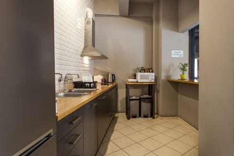 Shared Dormitory, Women only (4 Guests) | Shared kitchen | Fridge, microwave, stovetop, cookware/dishes/utensils