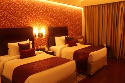 Deluxe Room, 2 Twin Beds, Non Smoking | Minibar, in-room safe, individually decorated, individually furnished