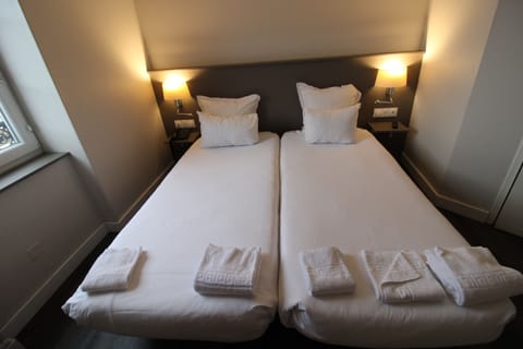 Twin Room | Memory foam beds, in-room safe, individually decorated