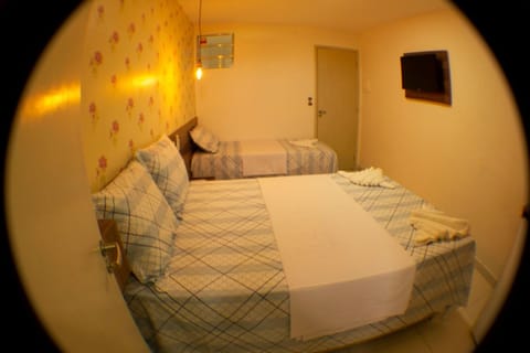 Triple Room | Minibar, iron/ironing board, free WiFi, bed sheets