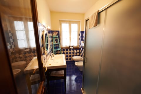 Classic Apartment | Bathroom | Hair dryer, towels, soap, toilet paper