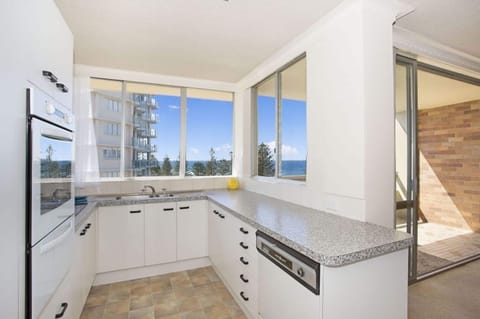 2-Bedroom Apartment | Private kitchen | Full-size fridge, microwave, oven, stovetop