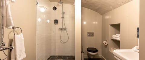 Cellar Suite | .15 | Bathroom | Shower, rainfall showerhead, eco-friendly toiletries, hair dryer