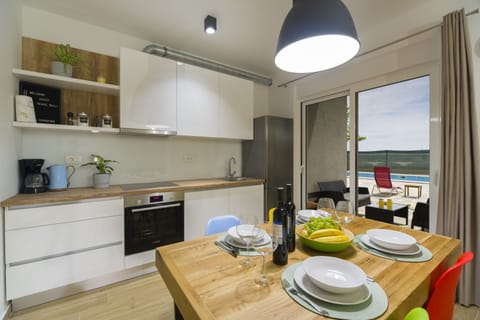 Luxury Apartment | Private kitchen | Full-size fridge, oven, stovetop, dishwasher