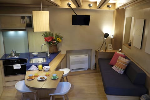 Design House | Private kitchen | Fridge, microwave, stovetop, toaster