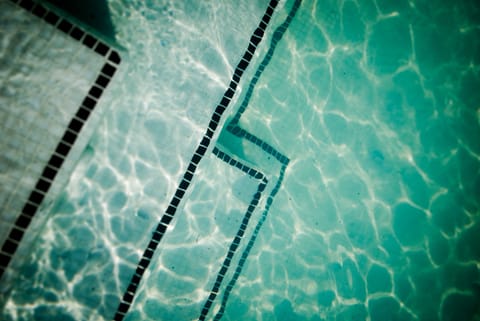 Outdoor pool, pool umbrellas, sun loungers