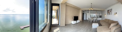 Deluxe Apartment | Living area | LCD TV, heated floors