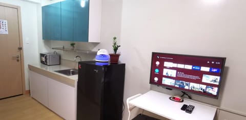 Butler's BnB (D) @ Trees Residences | Private kitchenette | Full-size fridge, microwave, stovetop, dishwasher