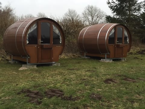 Wooden barrel with shared bathroom