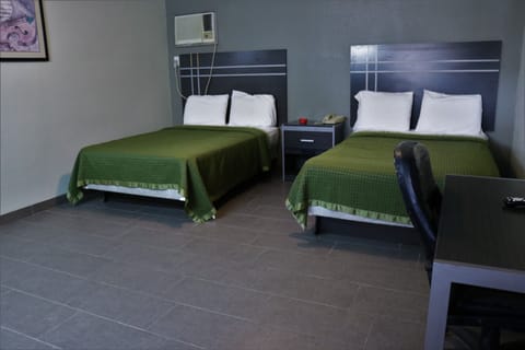 Deluxe Room, 2 Queen Beds | Iron/ironing board, free WiFi, bed sheets