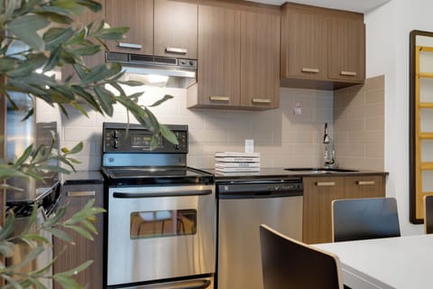 Superior Apartment, Multiple Beds, City View, Mezzanine (The Main 204) | Private kitchen | Full-size fridge, microwave, oven, stovetop