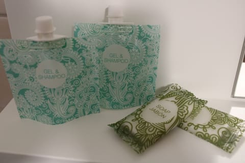 Shower, rainfall showerhead, free toiletries, hair dryer