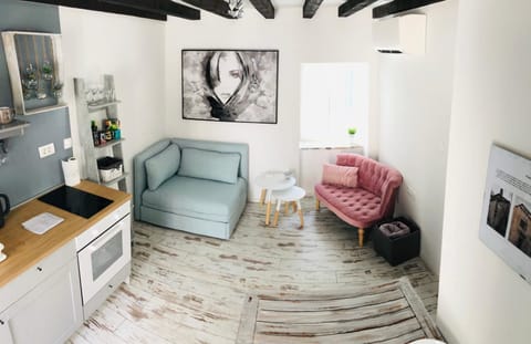 Superior Studio | Living area | Flat-screen TV