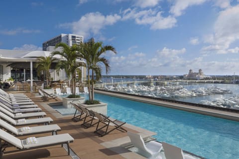 Outdoor pool, pool umbrellas, sun loungers