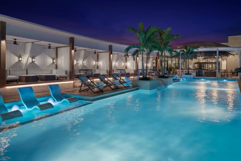 Outdoor pool, pool umbrellas, sun loungers