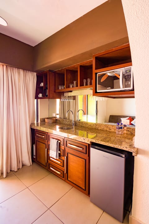 Standard Room, Ocean View | In-room safe, iron/ironing board, free WiFi, bed sheets