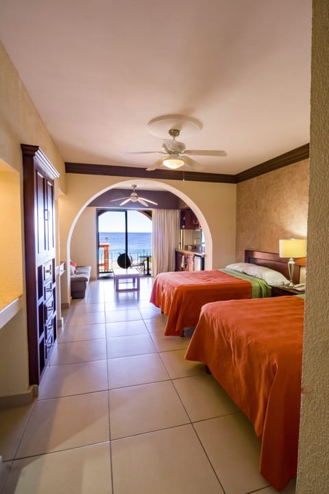 Standard Room, Ocean View | In-room safe, iron/ironing board, free WiFi, bed sheets