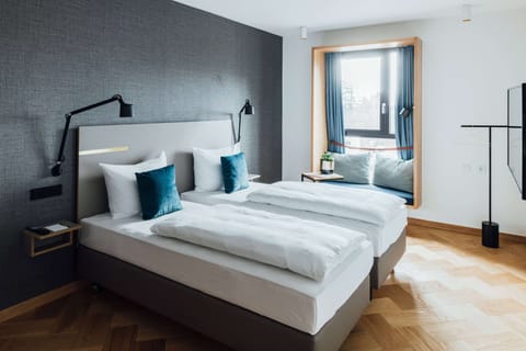 Hypo-allergenic bedding, in-room safe, desk, laptop workspace