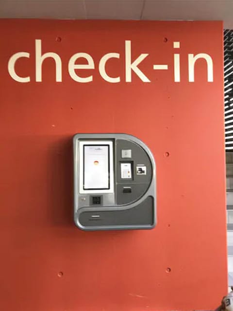 Check-in/check-out kiosk