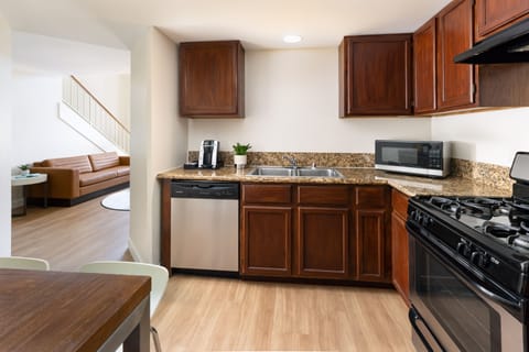 Suite, 3 Bedroom | Private kitchen | Fridge, microwave, coffee/tea maker