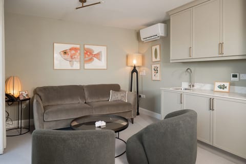 The Salthouse Suite | Living area | 50-inch Smart TV with digital channels