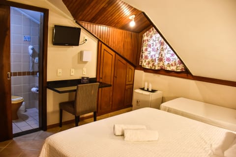 Standard Triple Room | Minibar, in-room safe, desk, free WiFi