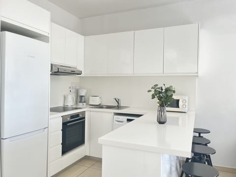 Apartment, Sea View | Private kitchen | Full-size fridge, microwave, oven, stovetop