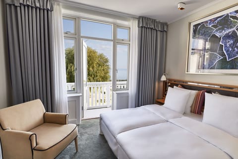 Double or Twin Room, Sea View, including evening spa access | Hypo-allergenic bedding, in-room safe, desk, blackout drapes