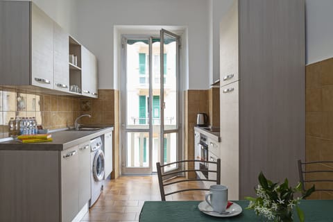 Apartment, 2 Bedrooms | Private kitchen | Full-size fridge, oven, stovetop, electric kettle