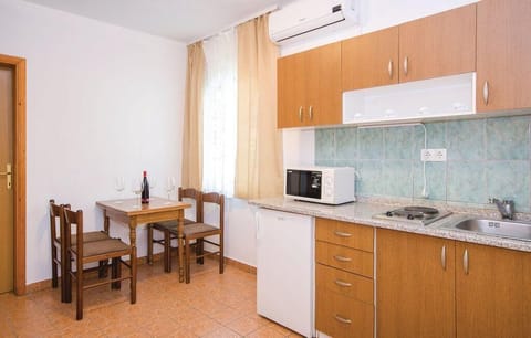 Apartment (Apartments Čiovo - Basic Two Bedroom) | Private kitchen | Fridge, microwave, stovetop, coffee/tea maker