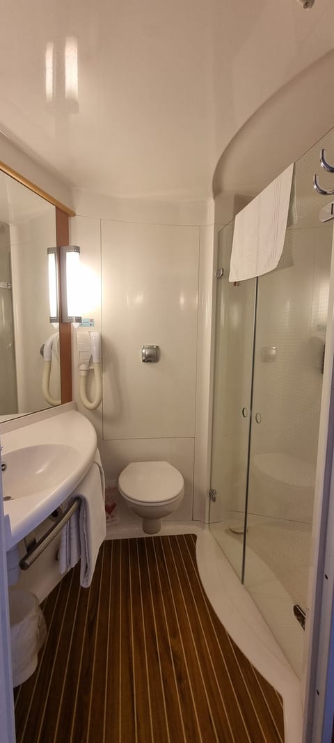 Shower, eco-friendly toiletries, hair dryer, towels