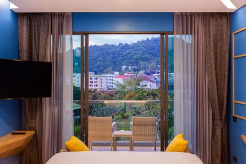 Premier Garden View Room With Balcony | Premium bedding, Select Comfort beds, minibar, in-room safe