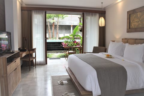 Suite Pool View | Pillowtop beds, minibar, in-room safe, individually decorated