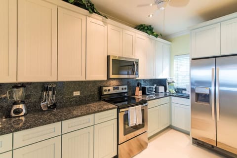 Swept Away In Ground Floor | Private kitchen | Full-size fridge, microwave, oven, stovetop