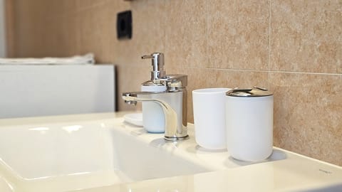 Romantic Triple Room, Multiple Beds, Private Bathroom (External) | Bathroom | Shower, rainfall showerhead, free toiletries, hair dryer