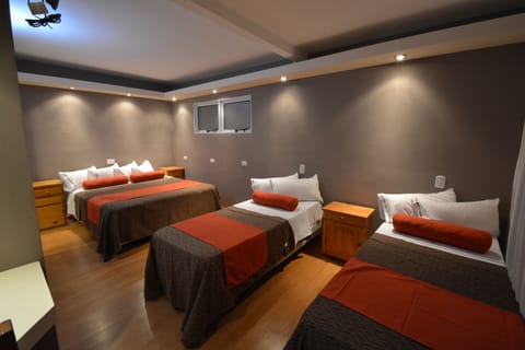 Standard Quadruple Room | In-room safe, blackout drapes, free WiFi, bed sheets