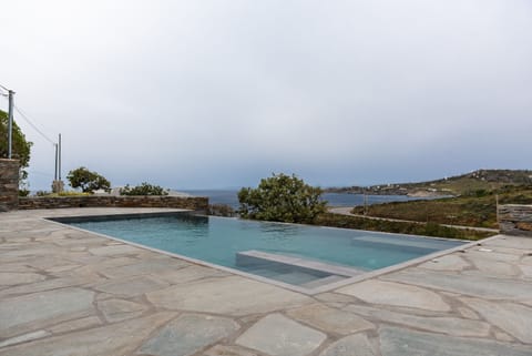 Seasonal outdoor pool, an infinity pool, sun loungers