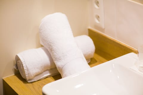 Double Room (Côté Mer) | Bathroom amenities | Shower, free toiletries, hair dryer, towels