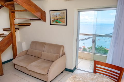 Deluxe Ocean View | Living area | LCD TV