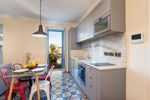 Deluxe Apartment, 2 Bedrooms, Partial Sea View (Marble) | Private kitchen | Full-size fridge, microwave, oven, stovetop