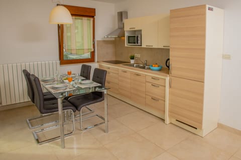 Comfort Apartment, 2 Bedrooms, Partial Sea View | Private kitchen | Fridge, microwave, stovetop, coffee/tea maker