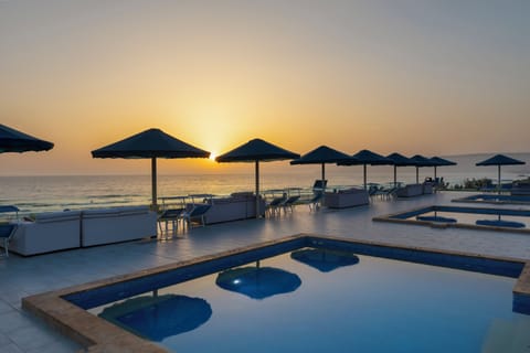 On the beach, sun loungers, beach umbrellas, beach towels