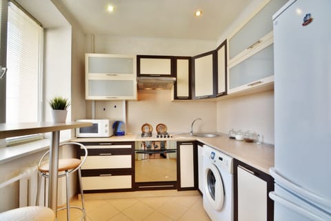 Apartment (Nezavisimosty prospect 52/4) | Private kitchen | Fridge, microwave, stovetop, electric kettle